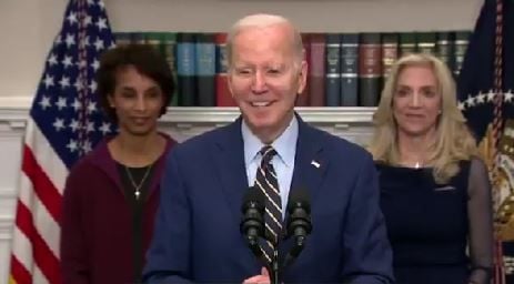 Biden combines the whisper thing with a chuckle while getting excited about a greatly expanded IRS